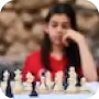 A picture of a lady playing chess